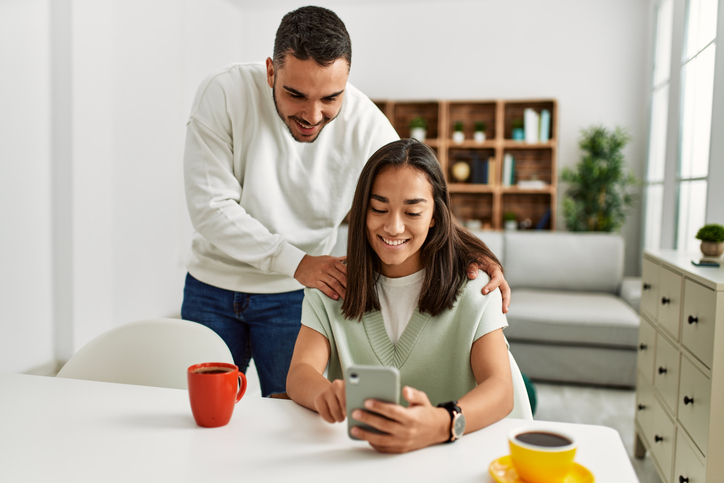 Couple looking at phone